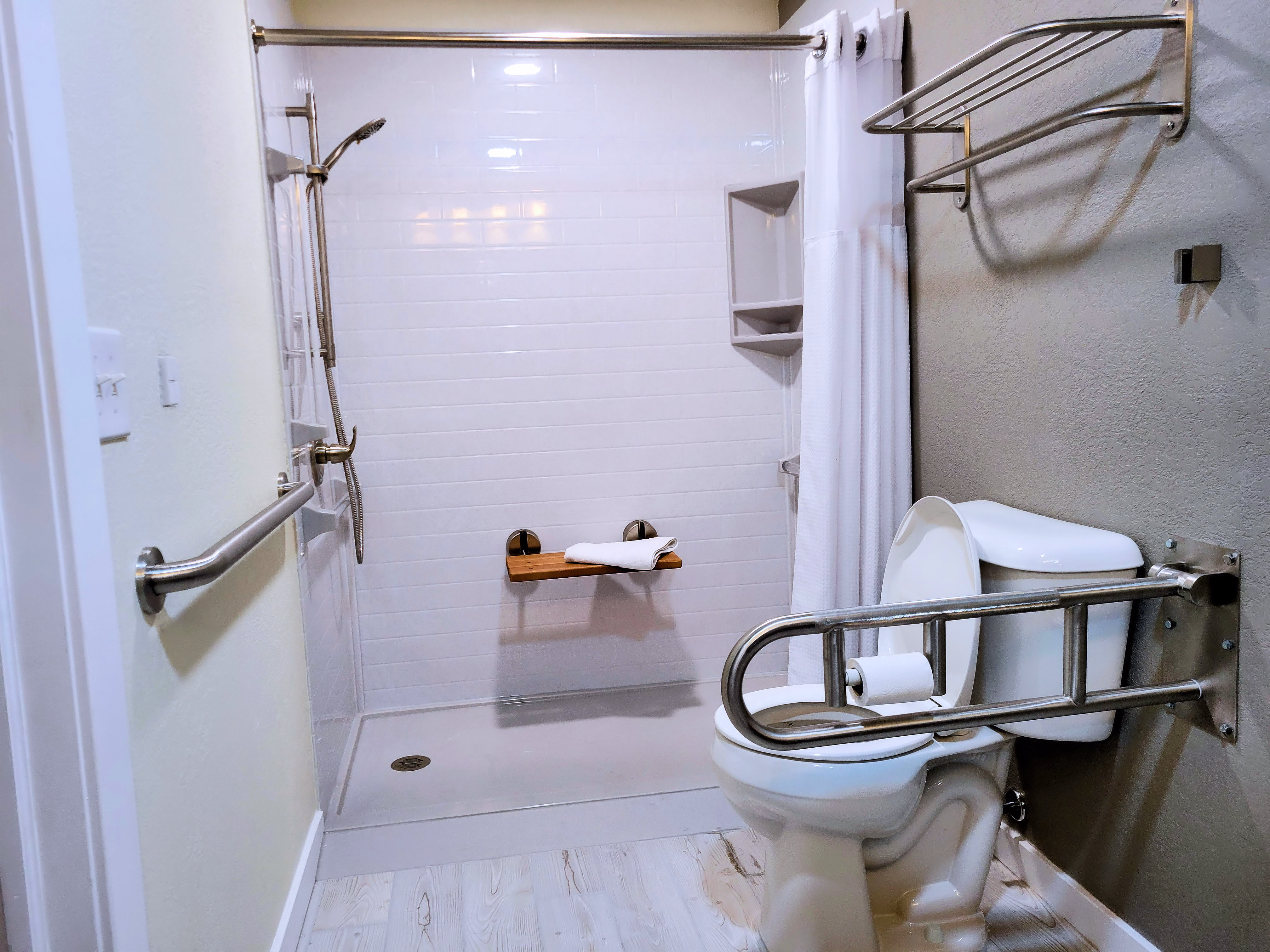 Roll-in shower in the ADA Accessible King Room
