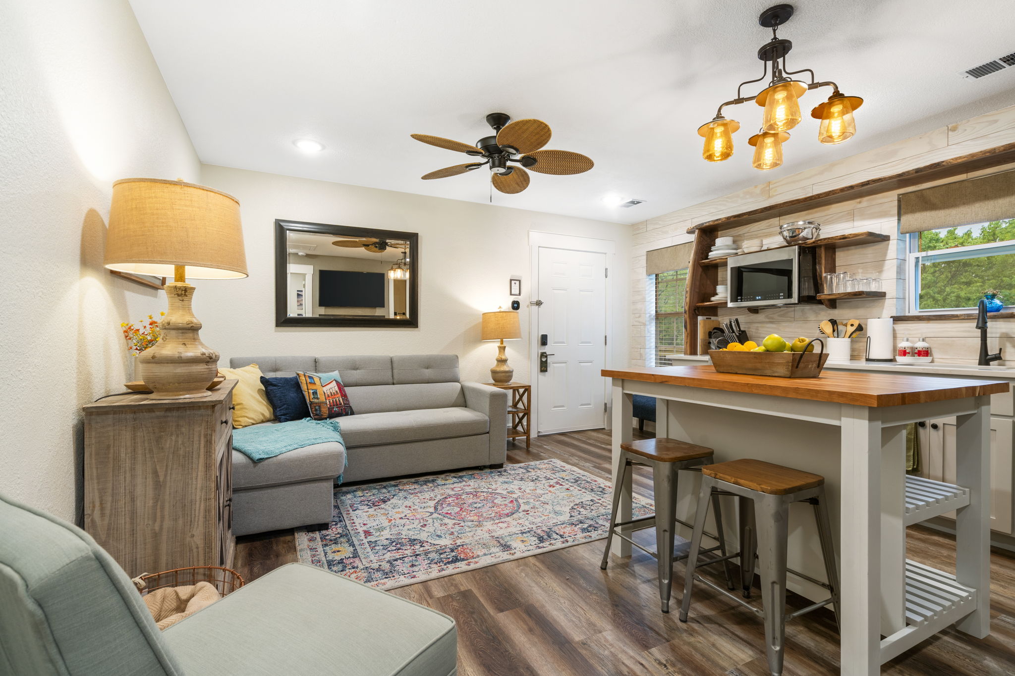 Sunlit living room in the Two-Bedroom Suite
